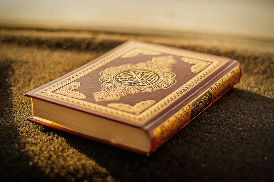 Islamic books open on a desk
